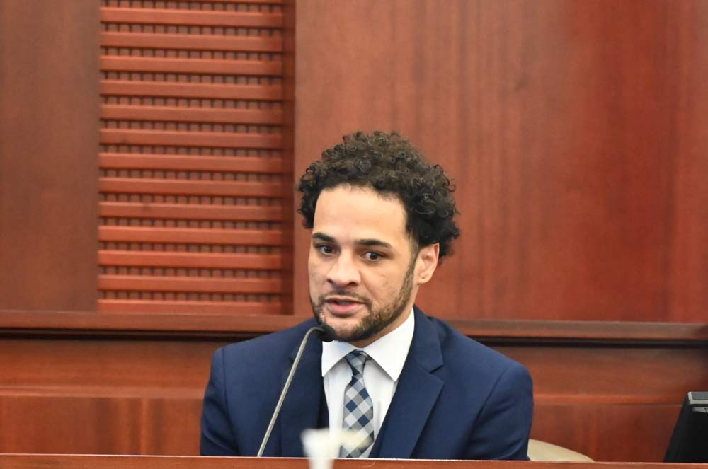 Brenan Hill spent almost all his 70 minutes on the stand today looking into the mic at a downward angle, only briefly making eye contact with jurors on a couple of occasions, or his own attorney. (© FlaglerLive)