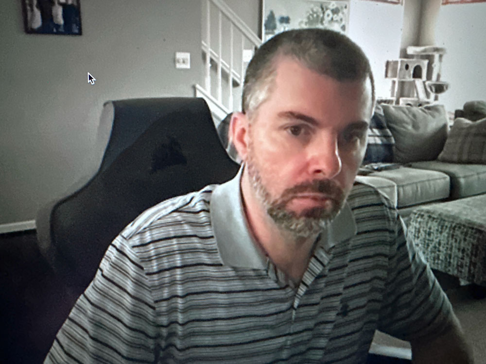 Brian Wothers zooming in from his home for his latest court hearing. (© FlaglerLive via zoom)