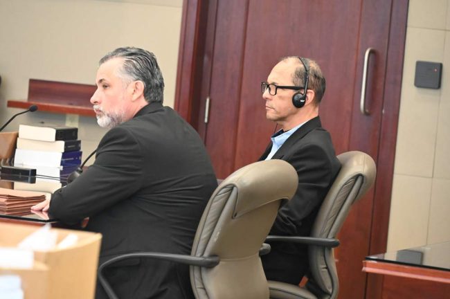 Defense attorney Harley Brook of Musca Law, left, and Teron, as the clerk was reading the veridct. Brook had tried the case with co-counsel Brook O'Sullivan, who was absent today due to a surgery scheduled before the Teron trial had been scheduled. (© FlaglerLive)