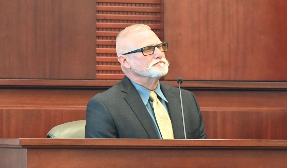 Bryan Jackson, testifying in his son's sentencing hearing for a hit-and-run conviction in June 2025. (© FlaglerLive)