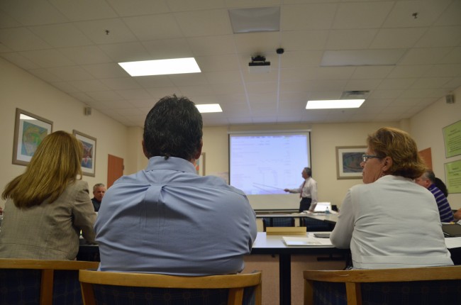 Flagler County School Board members heard their budget's  unsettling math from Finance Director Tom Tant during a workshop Tuesday. From left, Colleen Conklin, Andy Dance, Tant, and Superintendent Janet Valentine. (© FlaglerLive)