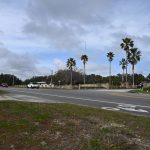 A roundabout will be built at the intersection of Old Kings Road and the entrance to Bulow Plantation, to the right, and Radiance, whose white-dirt driveway is visible to the left. (© FlaglerLive)