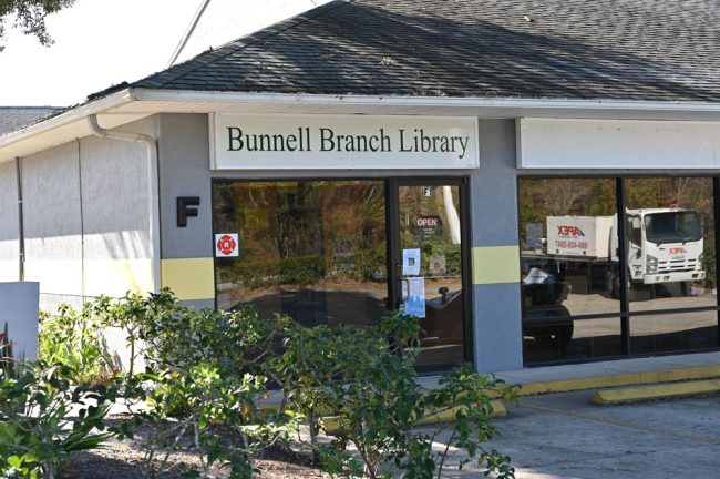 The Bunnell Branch Library in its tiny storefront at Marvin's Garden. (© FlaglerLive)