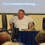 Bunnell City Commissioner Jan Reeger, left, didn;t get far as fellow-Commissioner John Rogers, center, then Mayor Catherine Robinson shut down Reeger's latest attempt to fire City Manager Alvin Jackson Monday evening. (© FlaglerLive)