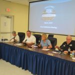 Bunnell city commissioners shortly before their vote to end the Sheltering Tree's operations of the cold-weather homeless shelter on Pine Street. The Justice Department investigation of the city will now burden City Attorney Wade Vose, left. (© FlaglerLive)