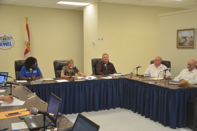 Bill Baxley, second from right, was seeking a return to commissioners' $9,600-a-year salary. His colleagues rebuffed him. From left, Commissioner Bonita Robinson, Mayor Catherine Robinson, Commissioners John Rogers and Elbert Tucker. (© FlaglerLive)