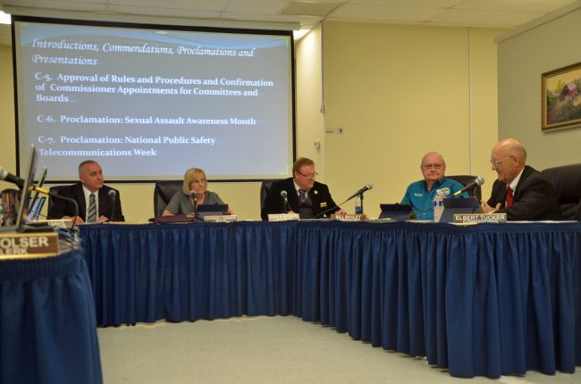 It's been a collegial commission: from left, John Sowell, Mayor Catherine Robinson, Vice Mayor John Rogers, Bill Baxley and Elbert Tucker. All but Rogers's seat will be on the March 5 ballot. (© FlaglerLive)