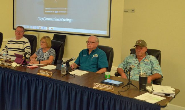 The Bunnell City Commission has been an oasis of calm through the pandemic. From left, Commissioner John Rogers, Mayor Catherine Robinson, Commissioners Bill Baxley and Donnie Nobles. Commissioner Tonya Gordon is not pictured. Baxley is stepping down. Nobles has been absent, and his future on the commission is uncertain. (© FlaglerLive)