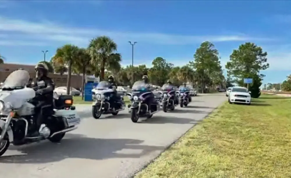 A still from a video of the procession returning Sgt. Guida to Flagler from the Medical Examiner's Office on Wednesday. See the video below. 