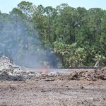 Trees and vegetation burned today on parts of the nearly 200 acres cleared of trees to make room for a 333-home subdivision called Sabel Preserve along Royal Palms Parkway in Palm Coast. (© FlaglerLive)