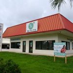 Flagler Tax Services operated for many years at the Bunnell Business Center, which includes the Chicken Pantry. The center was for sale. (© FlaglerLive)