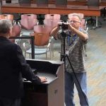 Ed Danko using City Hall's chamber two years ago to film a campaign video or Alan Lowe. (© FlaglerLive via Palm Coast)