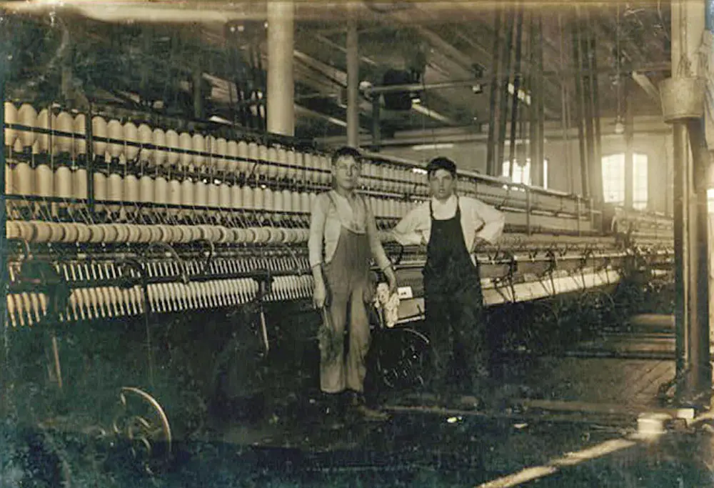 French Canadian boys working in a New Bedford, Mass., textile factory in 1912. (Library of Congress.)