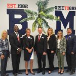 The superintendent candidates and school board members at Thursday's meet-and-greet at Buddy Taylor Middle School. From left,