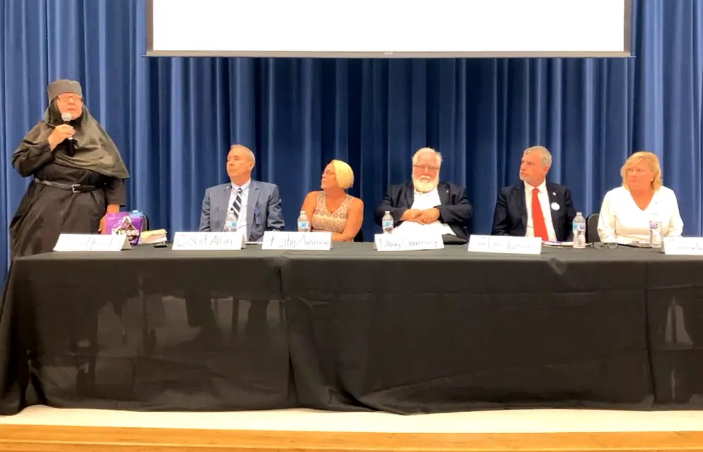 The candidates in a screen capture from the News-Journal's social media video of the forum at Buddy Taylor Middle School. From left, Carol Bacha, David Alfin, Kathy Austrino, Doug Courtney, Alan Lowe and Cornelia Manfre. 