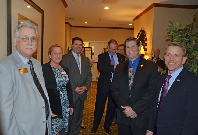 The candidates just before the forum: from left, Ron Sanchez, Danielle Anderson, Travis Hutson, moderator David Ayres, Doc Renuart and Paul Renner. (© FlaglerLive)