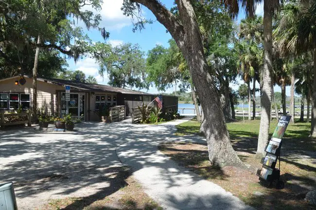 Captain's BBQ at Bing's Landing has been at loggerheads with county government over the siting of the restaurant and its potential expansion, but in one legal case, the restaurant and the county are defending themselves on the same side. (© FlaglerLive)