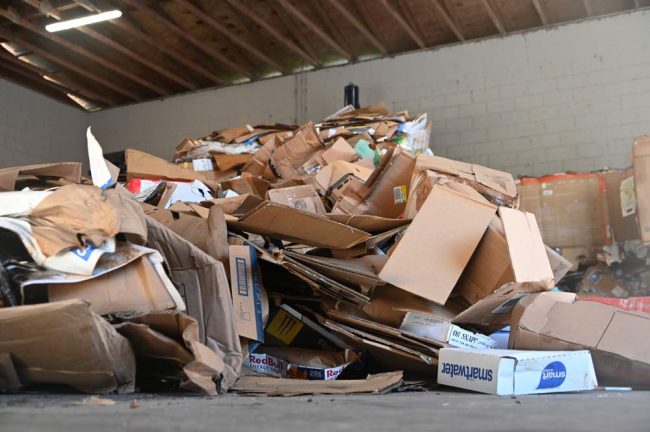 There's no shortage in trashed cardboard at the Sanitation Department. (© FlaglerLive)