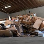 A cardboard recycling pile at Flagler Beach's utility plant. (© FlaglerLive)