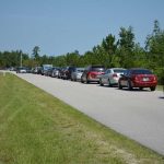 The car line eevry Saturday and Sunday leading into Grace Community Food Pantry on Education Way off U.S. 1. It usually extends out and up the highway. (Grace Community)