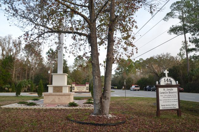 Magggie Olivera was found in her car between St. Mary's Catholic Church and St. Joseph's Carmelite Monastery on South Old Dixie Highway Saturday afternoon. (© FlaglerLive) 