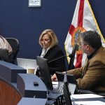 County Commissioner Kim Carney, center, considers Flagler Beach's annexation of Veranda Bay illegal. She favors potential litigation, and got support for discussion toward that possibility from Chair Leann Pennington, left, and Pam Richardson. Andy Dance, right, and Greg Hansen were opposed. (© FlaglerLive)