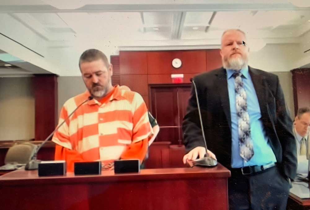 Carroll himself did not make a statement. He stood next to his attorney, looking much healthier and fuller, after a year and a half in jail, than the emaciated, carcass-like body he was t the time of his arrest in July 2021. He only mumbled a few answers today, keeping his gaze down-turned. 