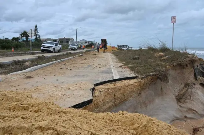 A Carveout around South 14th Street on A1A today, as trucks dumped sand to fill in another carveout a little further north. (© FlaglerLive)