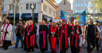 Catholic bishops invited by Mark Seitz, center, the bishop of El Paso, Texas, lead a march in solidarity with migrants on March 24, 2025, in downtown El Paso.