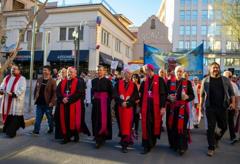 Catholic bishops invited by Mark Seitz, center, the bishop of El Paso, Texas, lead a march in solidarity with migrants on March 24, 2025, in downtown El Paso.