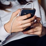 Teenagers have phones glued to their hands… but often don’t answer when you call. (Wikimedia Commons)