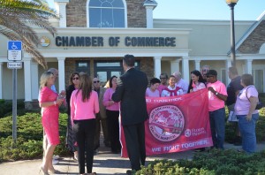 The flag-raising ceremony at the Chamber of Commerce Monday morning. Click on the image for larger view. (© FlaglerLive)