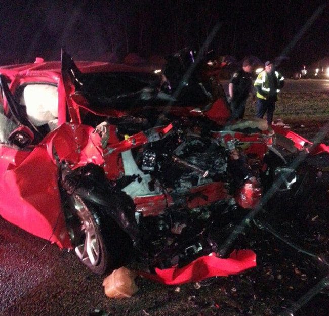 The red Charger was on fire when paramedics arrived at the scene at U.S. 1 near CR 304 Sunday night. (Flagler County Professional Firefighters)