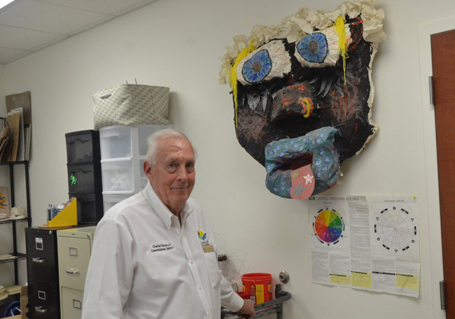 Flagler County Commissioner Charlie Ericksen, seen here during a visit at Stewart-Marchman-Act's Women Assisting Recovering Mothers program in Bunnell (he was in the art therapy room), marked his 75th birthday Saturday. (© FlaglerLive)