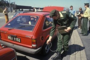 A German security guard checks for radiation after the Chernobyl accident in April 1986. Patric