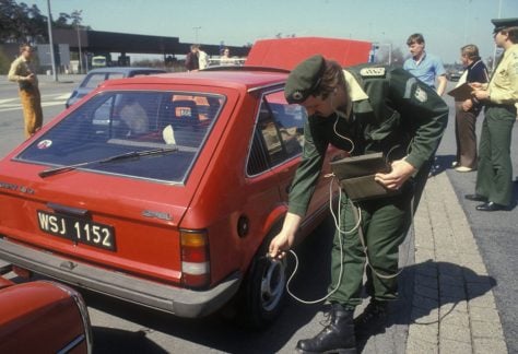 A German security guard checks for radiation after the Chernobyl accident in April 1986. Patric