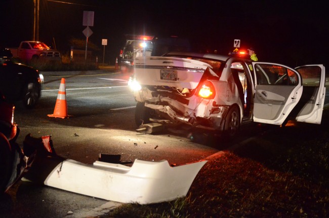 The Chevy Malibu, crushed from both sides, was the most damaged of the three cars. Click on the image for larger view. (© FlaglerLive)