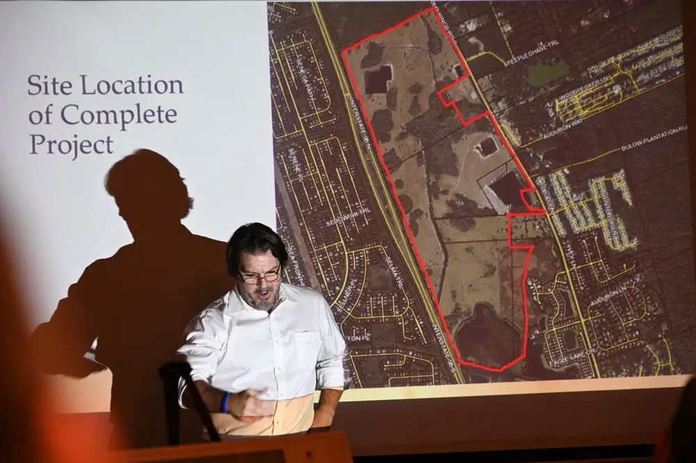 Michael Chiumento, the Palm Coast attorney who represents the future developers of Eagle Lakes, presenting the project at a neighborhood meeting on Dec. 7 at the Hilton Garden Inn. (© FlaglerLive)