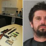 Christopher Raymond and the weaponry found in his truck, with K-9 Axel. (FCSO)