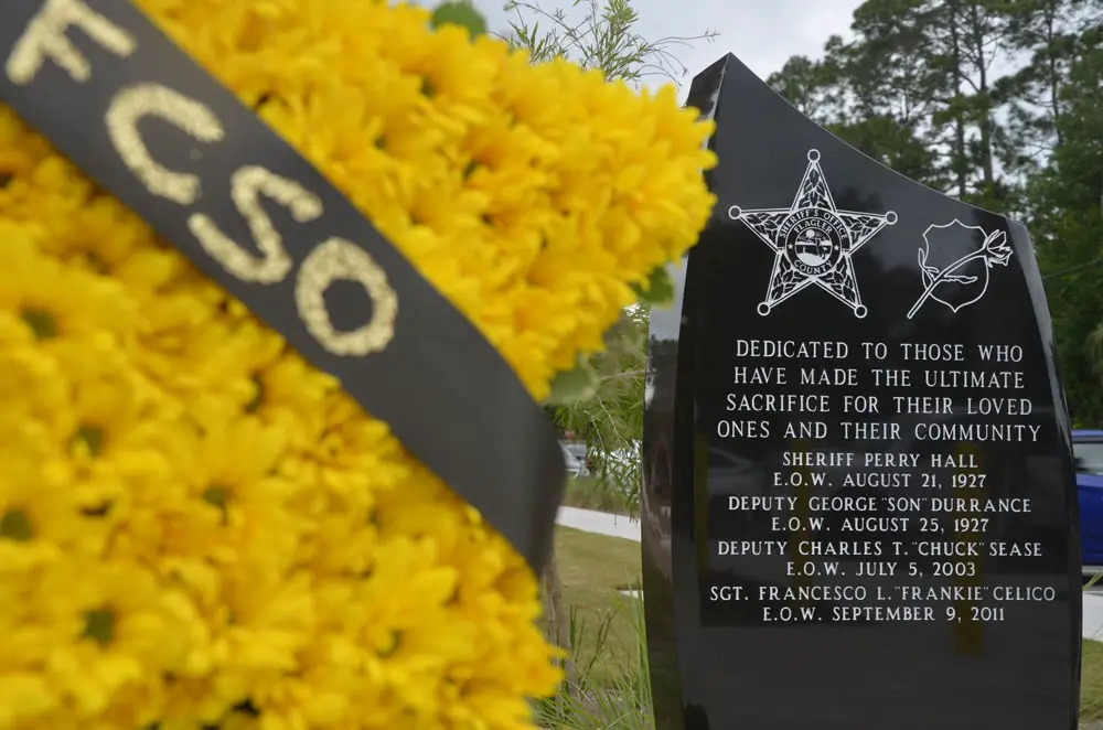 Deputy Charles Sease's name is one of five law enforcement officers' names engraved on the Flagler County Sheriff's memorial to the fallen, and the last officer to die from a hostile act in Flagler, in 2003. (© FlaglerLive)