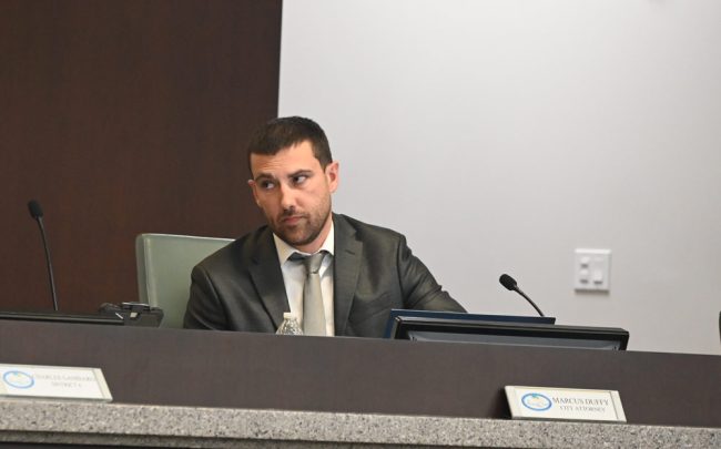 A forceful Marcus Duffy, the city attorney, stood down Mike Norris today. (© FlaglerLive)