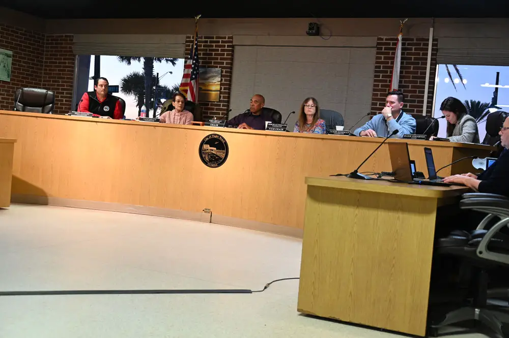 The Flagler Beach City Commission this afternoon as its members listened to a candidate for interim manager who'd called in by phone. (© FlaglerLive)