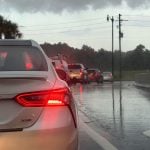 One of those exasperating back-ups on Royal Palms Parkway as cars attempt a left turn on Town Center Boulevard. The intersection will become a three-way stop starting July 3. (© FlaglerLive)