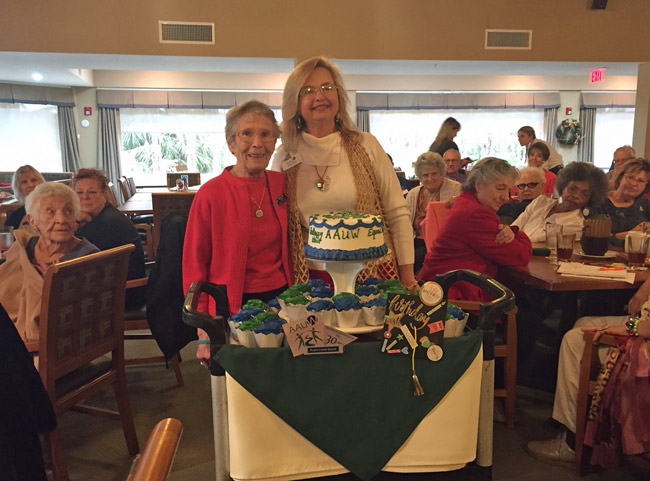 The American Association of University Women on Saturday celebrated the 90th birthday of Mary Ann Clark, left, who appears here with the group's president, Kimble Medley. (© FlaglerLive)