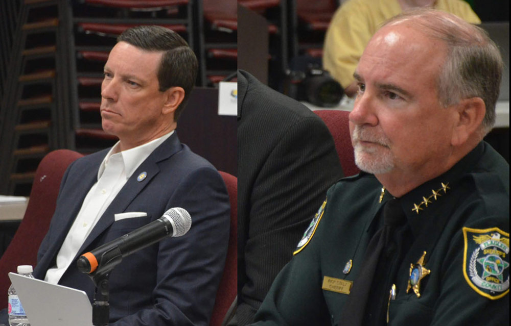 Flagler County Clerk of Curt Tom Bexley, left, and Sheriff Riock Stalky, seen here in a file photo, demurred when Commission Chair Andy Dance asked them if they were going to participate in the state's doge-like efficiency drive, citing the fact that the state did not direct its letter to them,. (© FlaglerLive)