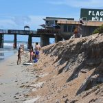 Cliffs instead of a beach: the nearly catastrophic erosion at the Flagler Beach pier and north of it is prompting an emergency response from city government, but options are limited and expensive. (© FlaglerLive)