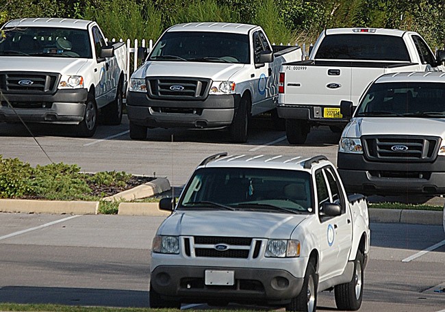 Palm Coast residents are not quite enthusiastic about code enforcement, whose visibility is emphasized by the city's fleet of frequent-driving trucks (seen here in a  file photo).  But the city has no plans to alter its approach. (© FlaglerLive)