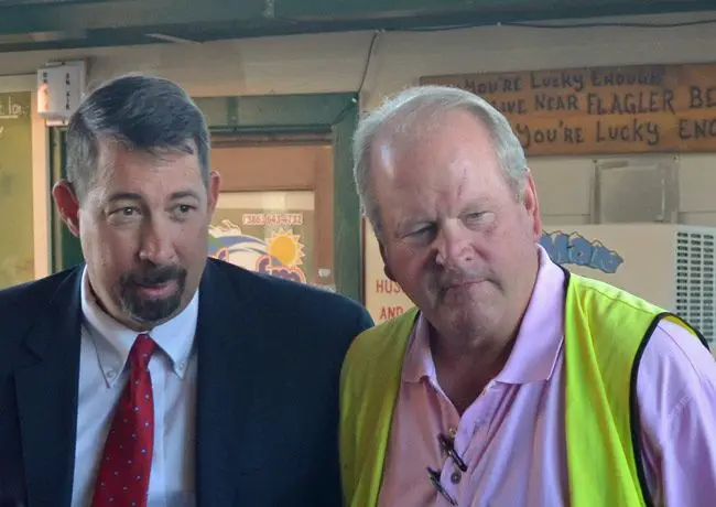 Flagler Beach City Manager Larry Newsom has again applied for work elsewhere, this time in Putnam County, where one of the people facilitating the search is Flagler County Administrator Craig Coffey, right, who frequently works with Newsom on beach-related issues. (© FlaglerLive)