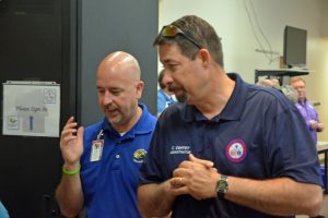 County Administrator Craig Coffey, right, and Superintendent Jacob Oliva at the county's Emergency Operations Center. (c FlaglerLive)