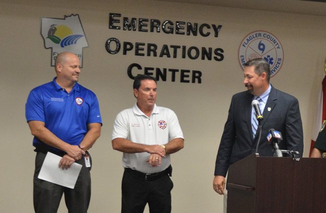 It's long been an uneasy relationship between Emergency Manager Steve Garten, left, Fire Chief Don Petito, center, and County Administrator Craig Coffey, who's been steering the emergency management division as its de facto chief. (c FlaglerLive)